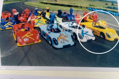 5-Yellow-car-in-front-row-a