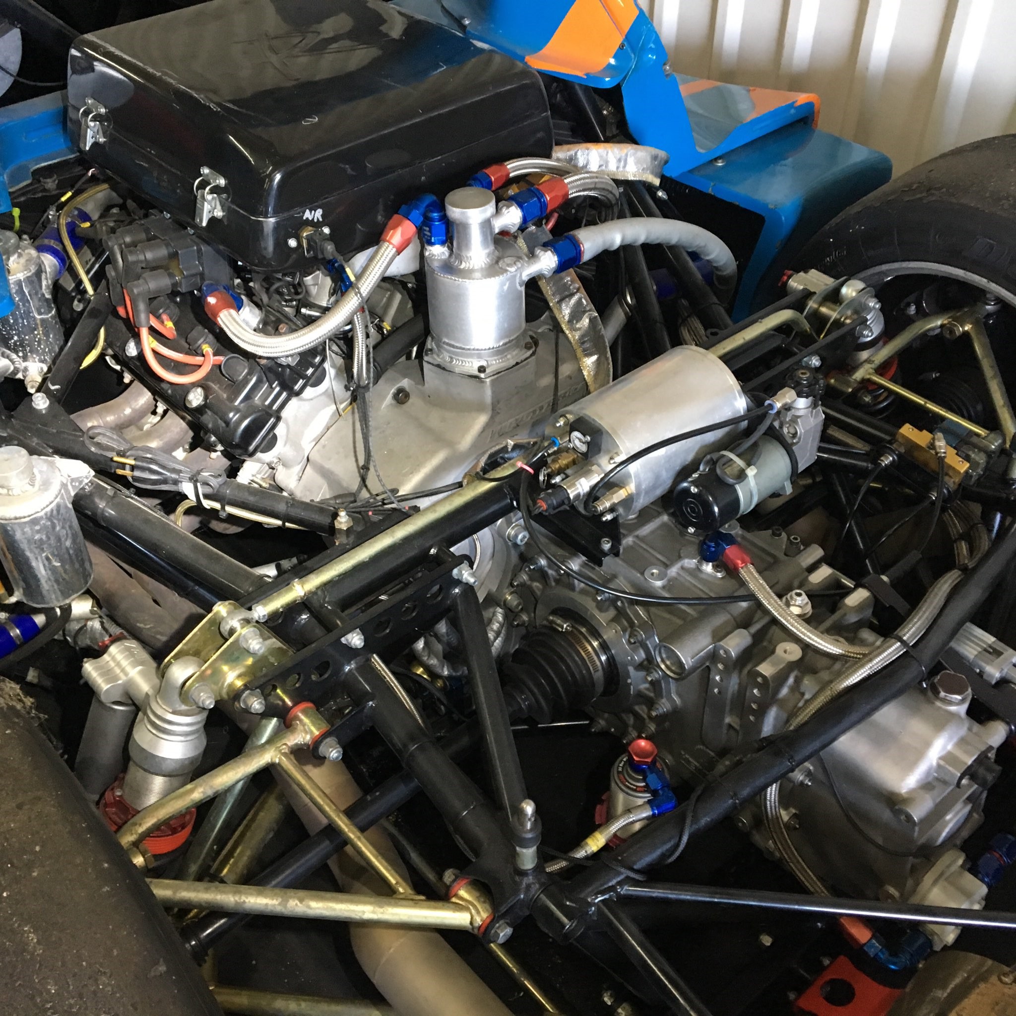 Read more about the article Question 4 – “I’m interested in how the SR8 was developed. I’ve got a couple of them (#42 and #87) and they came with such different equipment! #42 came with an AiM dash and a Quaife QBE58G gearbox, and the #87 came with a Stack dash and a Hewland JFR200 gearbox. Later came the QBE72G gearbox. Can you share any stories or history about how you worked with those different suppliers as the SR8 evolved from 2005 to 2012 (when it all seemed to come together to a single supplier set).     Thanks!   John (@parsonsj)